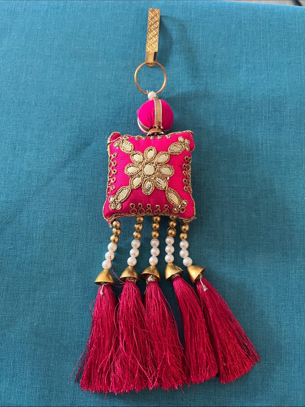 Decorative Hot Pink Tassel Bag Charm with Gold Embellishment